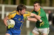 26 January 2014; Cathal Cregg, Roscommon, in action against Paddy Maguire, Leitrim. FBD League, Final, Leitrim v Roscommon. Páirc Sean Mac Diarmada, Carrick on Shannon, Co. Leitrim. Picture credit: David Maher / SPORTSFILE