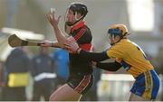 26 January 2014; Patrick Deasy, UCC, in action against Seadna Morey, Clare. Waterford Crystal Cup Semi-Final, Clare v University College Cork. Sixmilebridge, Co. Clare. Picture credit: Diarmuid Greene / SPORTSFILE
