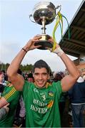 26 January 2014; Leitrim captain Emlyn Mulligan celebrates with the cup at the end of the game. FBD League, Final, Leitrim v Roscommon. Páirc Sean Mac Diarmada, Carrick on Shannon, Co. Leitrim. Picture credit: David Maher / SPORTSFILE