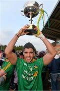 26 January 2014; Leitrim captain Emlyn Mulligan celebrates with the cup at the end of the game. FBD League, Final, Leitrim v Roscommon. Páirc Sean Mac Diarmada, Carrick on Shannon, Co. Leitrim. Picture credit: David Maher / SPORTSFILE