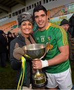 26 January 2014; Leitrim captain Emlyn Mulligan celebrates with his girlfriend Elaine Kearns at the end of the game. FBD League, Final, Leitrim v Roscommon. Páirc Sean Mac Diarmada, Carrick on Shannon, Co. Leitrim. Picture credit: David Maher / SPORTSFILE