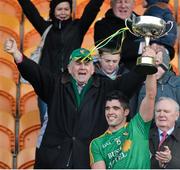 26 January 2014; Leitrim captain Emlyn Mulligan lifts the FBD Cup. FBD League, Final, Leitrim v Roscommon. Páirc Sean Mac Diarmada, Carrick on Shannon, Co. Leitrim. Picture credit: David Maher / SPORTSFILE