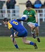 26 January 2014; Robert Lowe, Leitrim, in action against Cathal Shine, Roscommon. FBD League, Final, Leitrim v Roscommon. Páirc Sean Mac Diarmada, Carrick on Shannon, Co. Leitrim. Picture credit: David Maher / SPORTSFILE