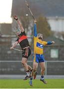 26 January 2014; Colin Ryan, Clare, in action against James Barry, UCC. Waterford Crystal Cup Semi-Final, Clare v University College Cork. Sixmilebridge, Co. Clare. Picture credit: Diarmuid Greene / SPORTSFILE