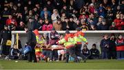 26 January 2014; Kilkenny's Eoin Larkin is stretchered off late in the game. galway's Darragh Burke, centre, had earlier been shown a red card. Bord Na Mona Walsh Cup, Semi-Final, Kilkenny v Galway, St. Lachtain's GAA Club, Freshford, Co. Kilkenny. Picture credit: Ray McManus / SPORTSFILE