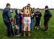 26 January 2014; Kilkenny forward Henry Shefflin signs autographs for supporters young and old after the game. Bord Na Mona Walsh Cup, Semi-Final, Kilkenny v Galway, St. Lachtain's GAA Club, Freshford, Co. Kilkenny. Picture credit: Ray McManus / SPORTSFILE