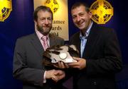 22 May 2005; GAA President Sean Kelly presents the GAA MacNamee Award for the 'Best Photograph on a GAA Theme' to Alan Betson of The Irish Times. Burlington Hotel, Dublin. Picture credit; Ray McManus / SPORTSFILE