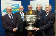 23 May 2005; Mick Finnucane, Kerry, Jimmy Magee, Gus Cremin, Kerry, John Wilson, Cavan, and Teddy Sullivan, Kerry, with the Sam Maguire Cup at the inaugural Lucozade Sport sponsored Association of Sports Journalists in Ireland Sporting Legends lunch to honour the surviving members of the 1947 All-Ireland Football Final played in the Polo Grounds, New York. Jury's Hotel, Ballsbridge, Dublin. Picture credit; Ray McManus / SPORTSFILE