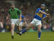 21 May 2005; Eoin Kelly, Tipperary, in action against Donal O'Grady, Limerick. Guinness Munster Senior Hurling Championship Quarter-Final Replay, Limerick v Tipperary, Gaelic Grounds, Limerick. Picture credit; Brendan Moran / SPORTSFILE