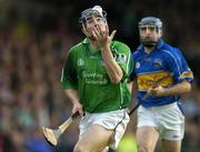 21 May 2005; Stephen Lucey, Limerick, in action against Eoin Kelly, Tipperary. Guinness Munster Senior Hurling Championship Quarter-Final Replay, Limerick v Tipperary, Gaelic Grounds, Limerick. Picture credit; Brendan Moran / SPORTSFILE