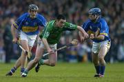 21 May 2005; Peter Lawlor, Limerick, in action against Mark O'Leary, left, and Eoin Kelly, Tipperary. Guinness Munster Senior Hurling Championship Quarter-Final Replay, Limerick v Tipperary, Gaelic Grounds, Limerick. Picture credit; Brendan Moran / SPORTSFILE