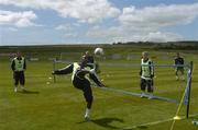 26 May 2005; Clinton Morrison assisted by Joe Murphy returns serve to Paddy Kenny, Damien Duff and Matt Holland during a game of football tennis at squad training. Malahide FC, Malahide, Dublin. Picture credit; Damien Eagers / SPORTSFILE