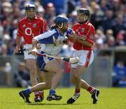 22 May 2005; James Murray, Waterford, in action against Brian Corcoran, left, and Ben O'Connor, Cork. Guinness Munster Senior Hurling Championship Semi-Final, Cork v Waterford, Semple Stadium, Thurles, Co. Tipperary. Picture credit; Brendan Moran / SPORTSFILE