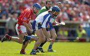 22 May 2005; James O'Connor, Waterford, in action against Kieran Murphy, Cork. Guinness Munster Senior Hurling Championship Semi-Final, Cork v Waterford, Semple Stadium, Thurles, Co. Tipperary. Picture credit; Brendan Moran / SPORTSFILE