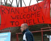 27 May 2005; Glen Crowe, Shelbourne, walks passed a flag erected by the Bohemians supporters before the start of the game. eircom League, Premier Division, Bohemians v Shelbourne, Dalymount Park, Dublin. Picture credit; David Maher / SPORTSFILE