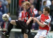 27 May 2005; Paul Keegan, Longford Town, in action against Colm Foley, St. Patrick's Athletic. eircom League, Premier Division, St. Patrick's Athletic v Longford Town, Richmond Park, Dublin. Picture credit; Matt Browne / SPORTSFILE