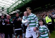 29 May 2005; Jackie McNamara, Celtic XI, with his children Syndney, left, and Erin, walk out onto the pitch. Jackie McNamara Testimonial, Celtic XI v Republic of Ireland XI, Celtic Park, Glasgow, Scotland. Picture credit; David Maher / SPORTSFILE