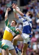 29 May 2005; Noel Garvan, Laois, in action against Pascal Kelleghan, Offaly. Bank of Ireland Leinster Senior Football Championship, Offaly v Laois, Croke Park, Dublin. Picture credit; Damien Eagers / SPORTSFILE