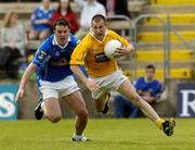 29 May 2005; Kevin Madden, Antrim, in action against Peter Reilly, Cavan. Bank of Ireland Ulster Senior Football Championship, Cavan v Antrim, Kingspan Breffni Park, Cavan. Picture credit; Matt Browne / SPORTSFILE