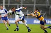 29 May 2005; Carol O'Keeffe, Waterford, in action against Ger Tubridy, Clare. Bank of Ireland Munster Senior Football Championship, Clare v Waterford, Cusack Park, Ennis, Co. Clare. Picture credit; Kieran Clancy / SPORTSFILE