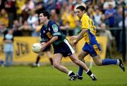 29 May 2005; John Niblock, London, in action against Ger Heneghan, Roscommon. Bank of Ireland Connacht Senior Football Championship, London v Roscommon, Emerald Gaelic Grounds, Ruislip, London. Picture credit; Brian Lawless / SPORTSFILE