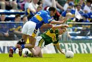 29 May 2005; Mike Frank Russell, Kerry, in action against Damien Byrne, Tipperary. Bank of Ireland Munster Senior Football Championship, Tipperary v Kerry, Semple Stadium, Thurles, Co. Tipperary. Picture credit; Brendan Moran / SPORTSFILE