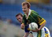 29 May 2005; Liam Hassett, Kerry, in action against Paul Morrissey, Tipperary. Bank of Ireland Munster Senior Football Championship, Tipperary v Kerry, Semple Stadium, Thurles, Co. Tipperary. Picture credit; Brendan Moran / SPORTSFILE