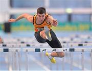26 January 2014; Sam Healy, Leevale A.C., on his way to winning the Junior Men's 60m Hurdles at the Woodie’s DIY Junior & U23 Championships of Ireland. Athlone Institute of Technology International Arena, Athlone, Co. Westmeath. Photo by Sportsfile