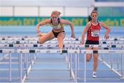26 January 2014; Sarah Lavin, left, UCD A.C., on her way to winning the Women's U23 60m Hurdles at the Woodie’s DIY Junior & U23 Championships of Ireland. Athlone Institute of Technology International Arena, Athlone, Co. Westmeath. Photo by Sportsfile