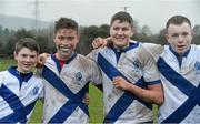 28 January 2014; St. Andrew's College players, from left, Hugh Black, Davide Davies Bailetta, Zola Henry and Ben Ryan celebrate after the game. Fr. Godfrey Cup, Semi-Final, St. Andrew's College v The High School, Ballycorus, Kiltiernan, Co. Dublin. Picture credit: David Maher / SPORTSFILE