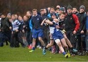 28 January 2014; Daragh Geraghy, St. Andrew's College, is tackled by Milo O'Sullivan, The High School. Fr. Godfrey Cup, Semi-Final, St. Andrew's College v The High School, Ballycorus, Kiltiernan, Co. Dublin. Picture credit: David Maher / SPORTSFILE