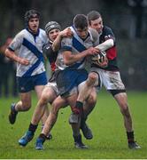 28 January 2014; Zola Henry, St. Andrew's College, is tackled by Ryan Baird, left, and Rhys Butler, The High School. Fr. Godfrey Cup, Semi-Final, St. Andrew's College v The High School, Ballycorus, Kiltiernan, Co. Dublin. Picture credit: David Maher / SPORTSFILE
