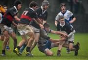 28 January 2014; Zola Henry, St. Andrew's College, is tackled by, from left, Jack Iredale, Ross MacWilliam, Ryan Baird, and Rhys Butler, The High School. Fr. Godfrey Cup, Semi-Final, St. Andrew's College v The High School, Ballycorus, Kiltiernan, Co. Dublin. Picture credit: David Maher / SPORTSFILE