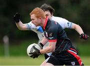 29 January 2014; Ross O'Donovan, IT Sligo, in action against Barry Tierney, UUJ. Irish Daily Mail Sigerson Cup, 1st Round, UUJ v IT Sligo, University of Ulster, Jordanstown, Co. Antrim. Picture credit: Oliver McVeigh / SPORTSFILE