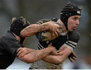29 January 2014; Conor Doyle, Newbridge College, is tackled by Simon Meagher, Cistercian College, Roscrea. Beauchamps Leinster Schools Senior Cup, 1st Round, Newbridge College v Cistercian College, Roscrea. Carlow RFC, Co. Carlow. Picture credit: Matt Browne / SPORTSFILE