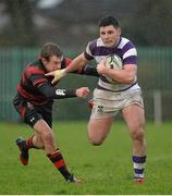 29 January 2014; Cian O'Donoghue, Clongowes Wood College, is tackled by Craig Miller, Kilkenny College. Beauchamps Leinster Schools Senior Cup, 1st Round, Clongowes Wood College v Kilkenny College, NUI Maynooth, Maynooth, Co. Kildare. Picture credit: David Maher / SPORTSFILE