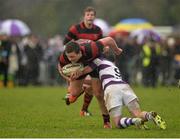 29 January 2014; Oisin Bradley, Kilkenny College , is tackled by Rowan Osborne, Clongowes Wood College. Beauchamps Leinster Schools Senior Cup, 1st Round, Clongowes Wood College v Kilkenny College, NUI Maynooth, Maynooth, Co. Kildare. Picture credit: David Maher / SPORTSFILE