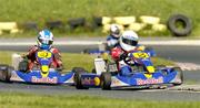 28 May 2005; Joel Mulholland, 5, Co. Antrim, in action against Gary Edwards, 4, Glanmire, Co. Cork, during the final stage of the Red Bull High King of Karting event. Athboy Karting Track, Athboy, Co. Meath. Picture credit; Matt Browne / SPORTSFILE