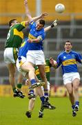 29 May 2005; Darragh O Se, Kerry, contests a high ball with Kevin Mulryan and Fergal O'Callaghan, Tipperary. Bank of Ireland Munster Senior Football Championship, Tipperary v Kerry, Semple Stadium, Thurles, Co. Tipperary. Picture credit; Brendan Moran / SPORTSFILE
