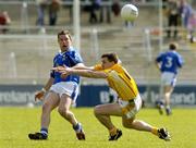 25 May 2003; Finbar O'Reilly of Cavan in action against Kevin Murray of Antrim during the Ulster GAA Football Senior Championship Quarter-Final match between Antrim and Cavan at Casement Park in Belfast. Photo by Matt Browne/Sportsfile