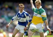 29 May 2005; James Coughlan, Offaly, in action against Joe Higgins, Laois. Bank of Ireland Leinster Senior Football Championship, Offaly v Laois, Croke Park, Dublin. Picture credit; David Levingstone / SPORTSFILE