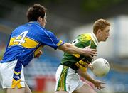 29 May 2005; Colm Cooper, Kerry, in action against Peter King, Tipperary. Bank of Ireland Munster Senior Football Championship, Tipperary v Kerry, Semple Stadium, Thurles, Co. Tipperary. Picture credit; Brendan Moran / SPORTSFILE