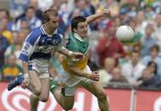 29 May 2005; Joe Higgins, Laois, in action against John Reynolds, Offaly. Bank of Ireland Leinster Senior Football Championship, Offaly v Laois, Croke Park, Dublin. Picture credit; Pat Murphy / SPORTSFILE