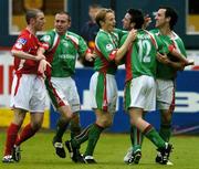 30 May 2005; Roy O'Donovan, second from right, Cork City, celebrates after scoring his sides first goal with team-mates left to right, Neal Horgan, Colin O'Brien and Neale Fenn, Cork City, as Shelbourne's Owen Heary remonstrates after the goal. eircom League, Premier Division, Shelbourne v Cork City, Tolka Park, Dublin. Picture credit; David Maher / SPORTSFILE