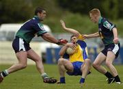 29 May 2005; David Casey, Roscommon, in action against Paul Hehir, left, and Paddy Quinn, London. Bank of Ireland Connacht Senior Football Championship, London v Roscommon, Emerald Gaelic Grounds, Ruislip, London. Picture credit; Brian Lawless / SPORTSFILE