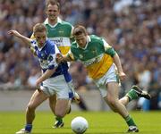 29 May 2005; Ross Munnelly, Laois, in action against Karol Slattery, Offaly. Bank of Ireland Leinster Senior Football Championship, Offaly v Laois, Croke Park, Dublin. Picture credit; Damien Eagers / SPORTSFILE