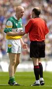 29 May 2005; Offaly's Conor Evans speaks to referee Michael Collins. Bank of Ireland Leinster Senior Football Championship, Offaly v Laois, Croke Park, Dublin. Picture credit; David Levingstone / SPORTSFILE