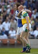 29 May 2005; Billy Sheehan, Laois, consoles Offaly's Conor Evans at the end of the match. Bank of Ireland Leinster Senior Football Championship, Offaly v Laois, Croke Park, Dublin. Picture credit; Damien Eagers / SPORTSFILE