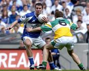 29 May 2005; Kevin Fitzpatrick, Laois, in action against Shane Sullivan, Offaly. Bank of Ireland Leinster Senior Football Championship, Offaly v Laois, Croke Park, Dublin. Picture credit; Pat Murphy / SPORTSFILE