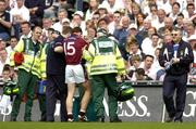 29 May 2005; Westmeath's Dessie Dolan is helped off the pitch by medical staff during the game. Bank of Ireland Leinster Senior Football Championship, Kildare v Westmeath, Croke Park, Dublin. Picture credit; Pat Murphy / SPORTSFILE